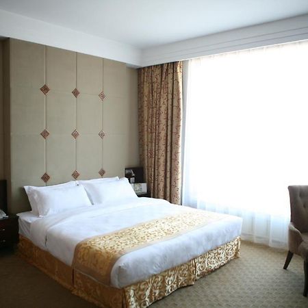 River-Sky Hotel Jiamusi Room photo