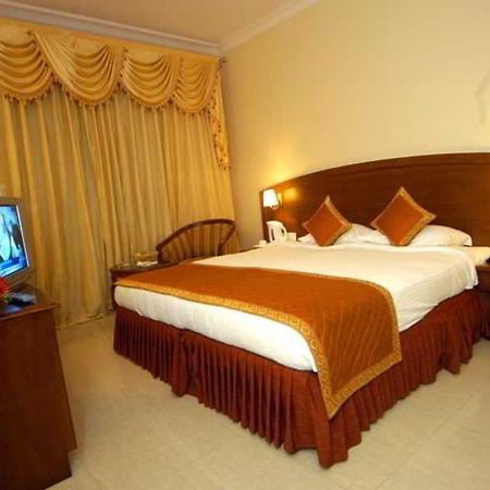 Aj International Hotel Bangalore Room photo