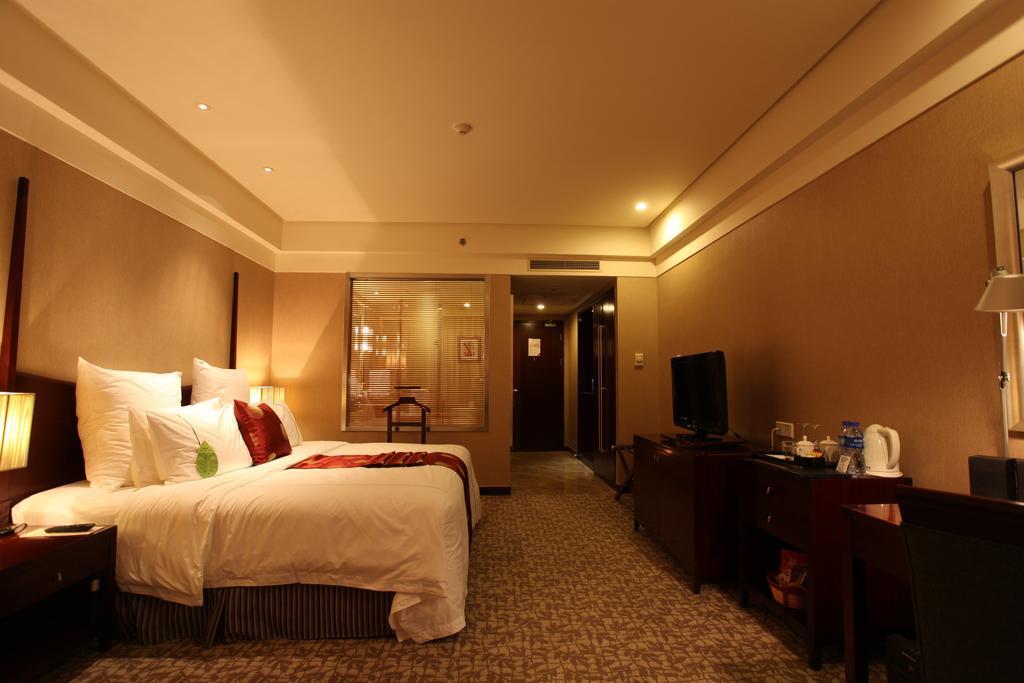 Ruiwan New Century Hotel Tianjin Room photo