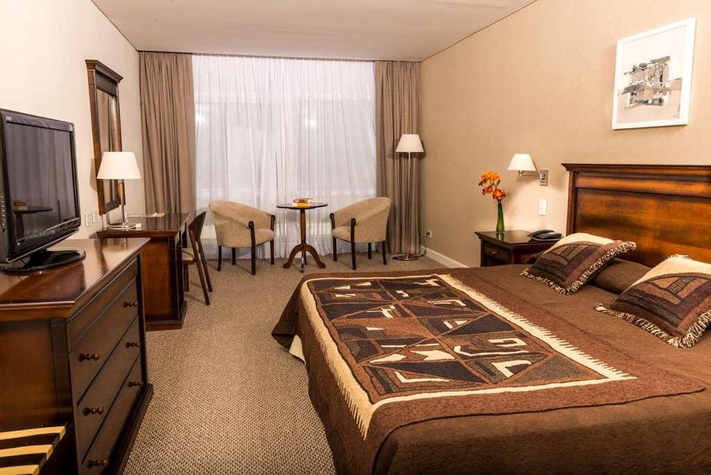 Howard Johnson Resort Spa & Convention Center Villa de Merlo Room photo