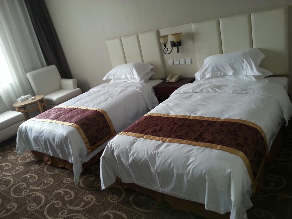 Xinxiang Zhongzhou Yihe Hotel Room photo