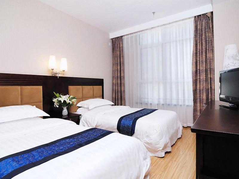 Qingdao Starway Hotel Economic & Technological Development Area Room photo