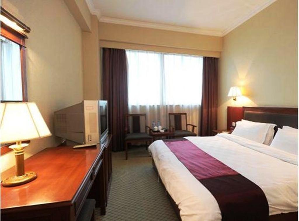 Shanghai Weson Grand Hotel Room photo