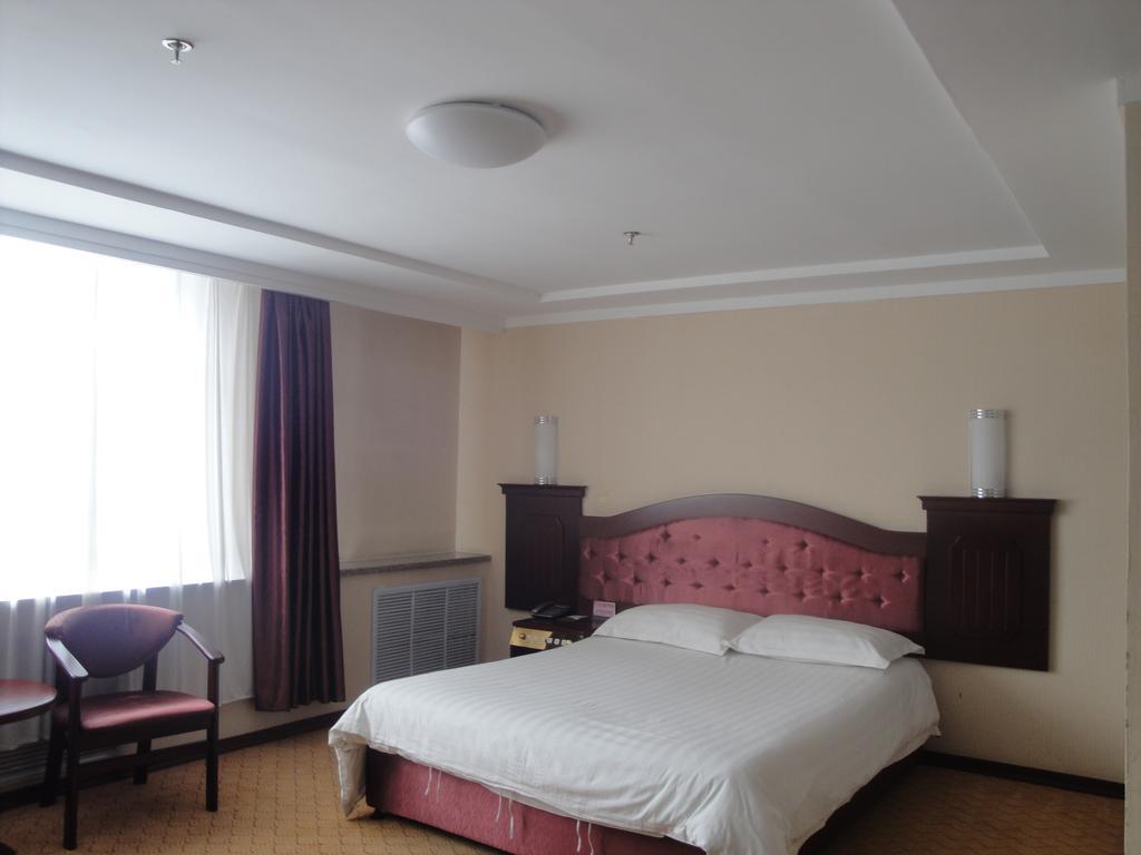 New Mart Hotel Mudanjiang Room photo