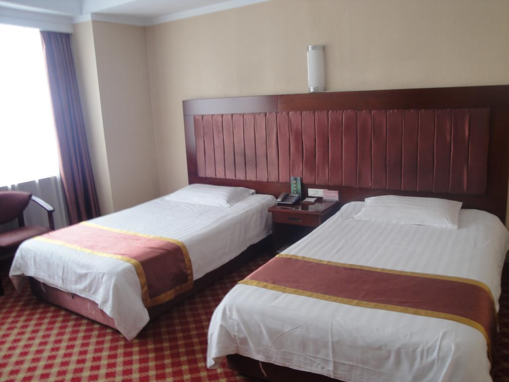 New Mart Hotel Mudanjiang Room photo