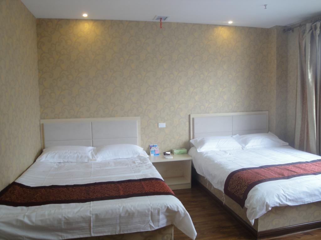 New Mart Hotel Mudanjiang Room photo