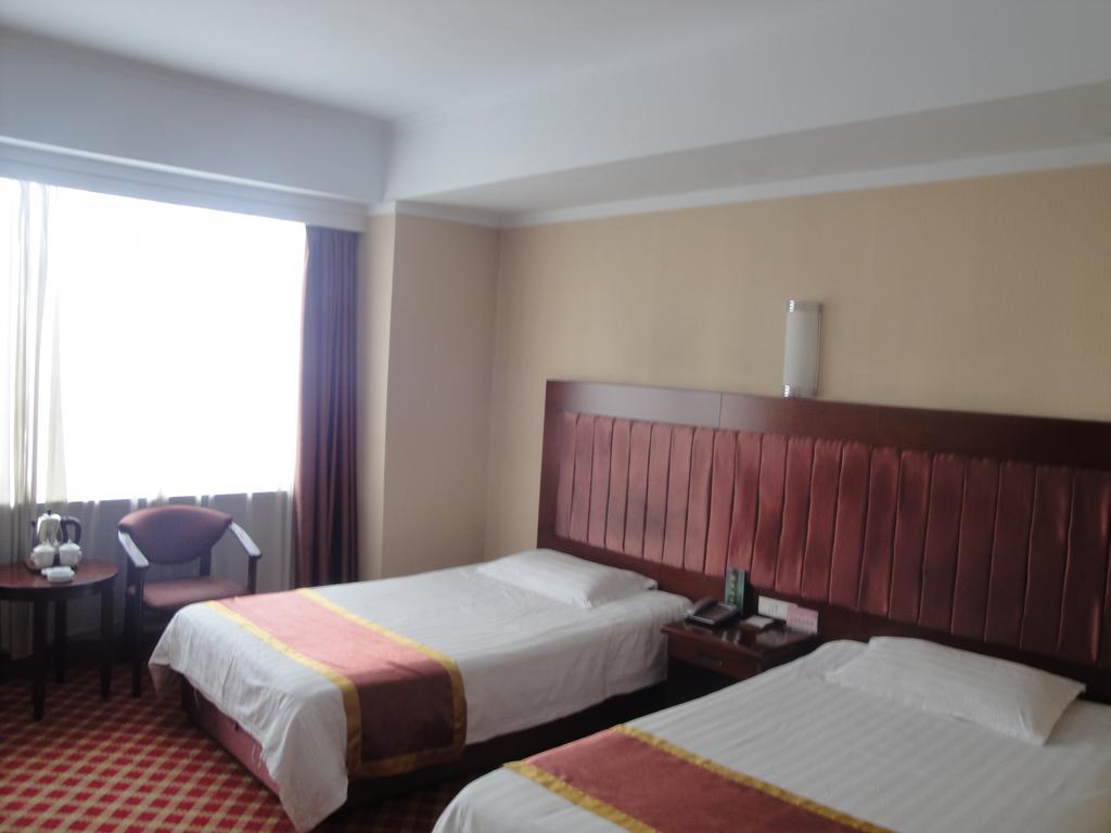 New Mart Hotel Mudanjiang Room photo