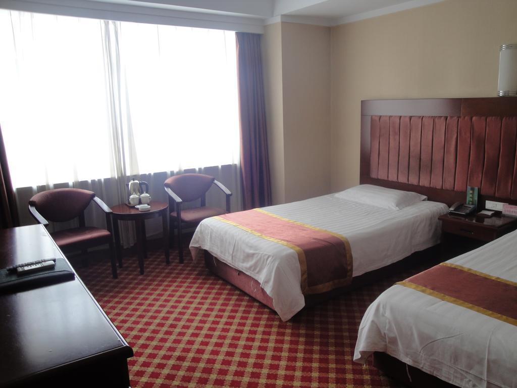 New Mart Hotel Mudanjiang Room photo