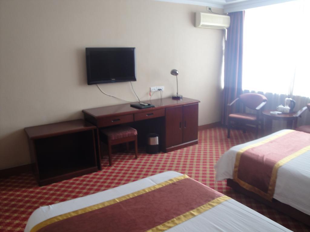 New Mart Hotel Mudanjiang Room photo