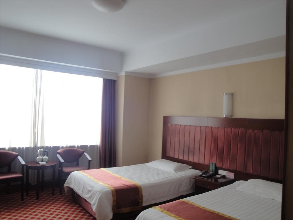 New Mart Hotel Mudanjiang Room photo