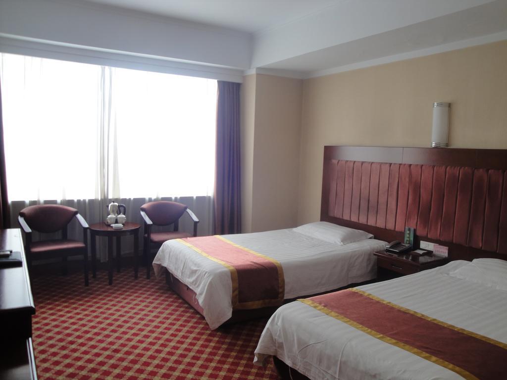 New Mart Hotel Mudanjiang Room photo