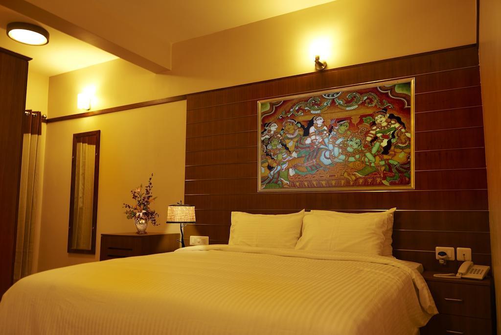 Srivar Hotels Guruvayur Room photo