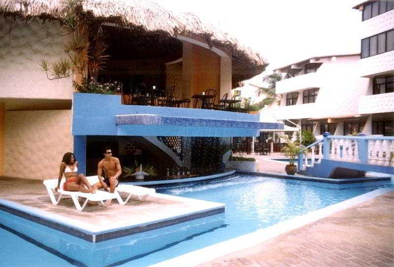 Hotel Puerta Del Sol Playa El Agua Exterior photo
