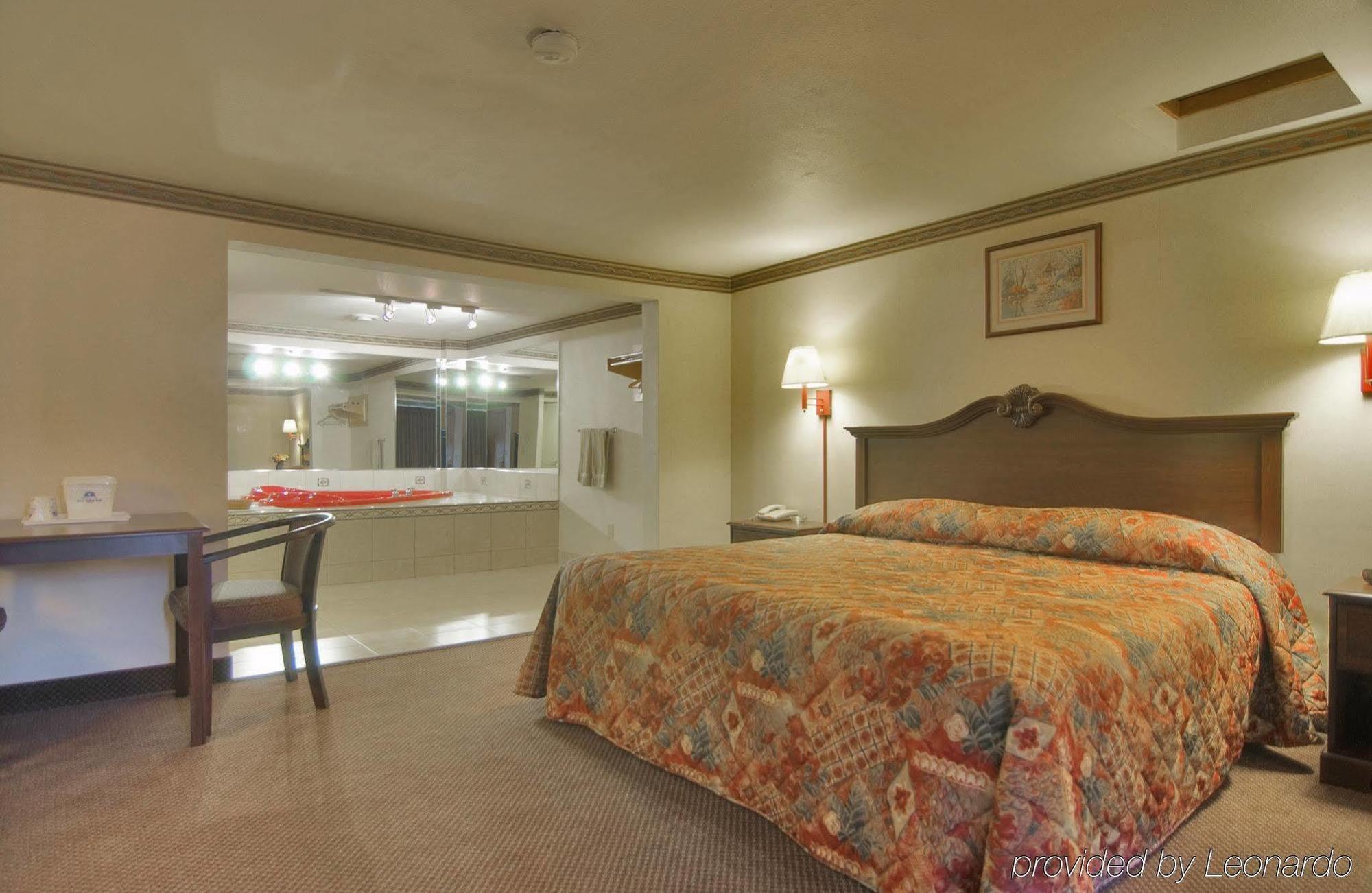 Amerivu Inn And Suites Wolcott Room photo