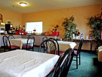 Days Inn & Suites By Wyndham Romeoville Restaurant photo