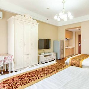 Dalian Xinyue Hotel Apartment Exterior photo